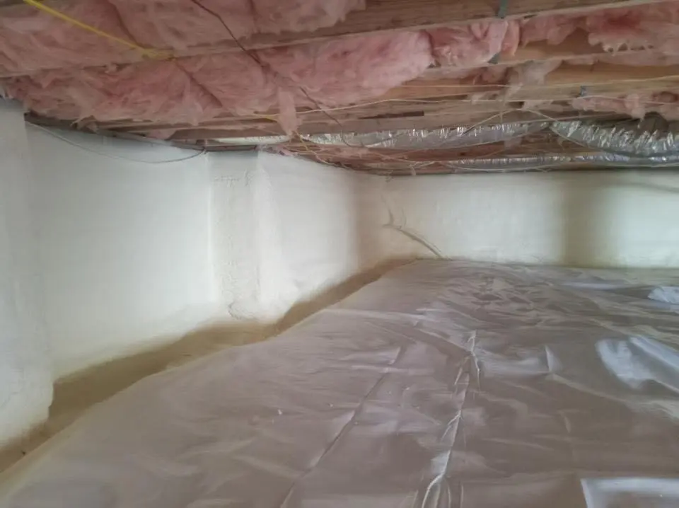 Crawl space encapsulation with closed-cell spray foam for Commercial Roof Restoration in East Cleveland